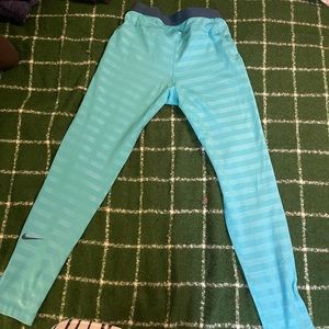 Teal Nike leggings.
